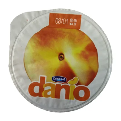 Spécialité laitière sur lit de pêche Danone